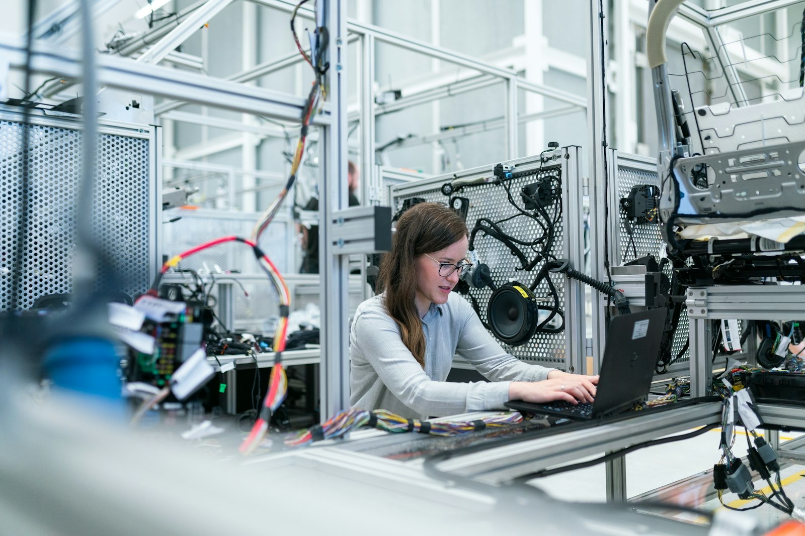 An In-Test engineer setting up testing equipment in the laboratory